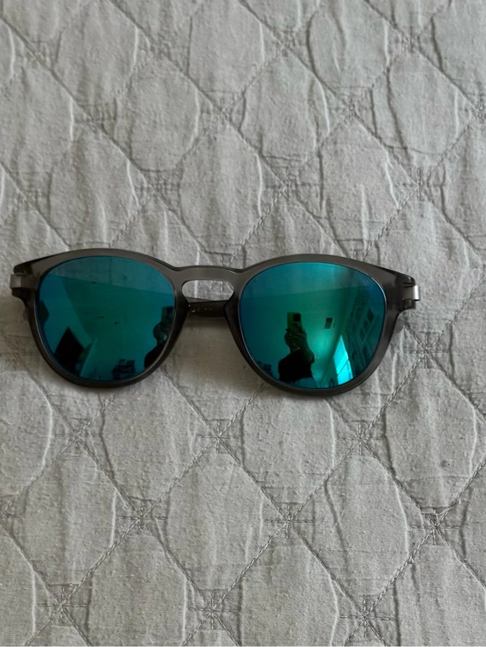 Oakley Round Sunglasses Gray Frame with Teal Blue Mirror Lenses